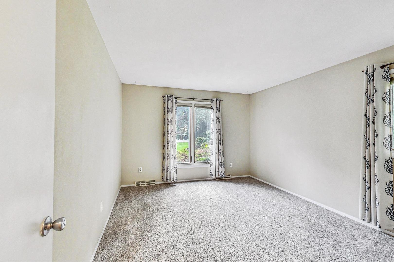 311 Deerpath Drive Winthrop Harbor, IL 60096 - Photo 26 of 48 an empty room with windows