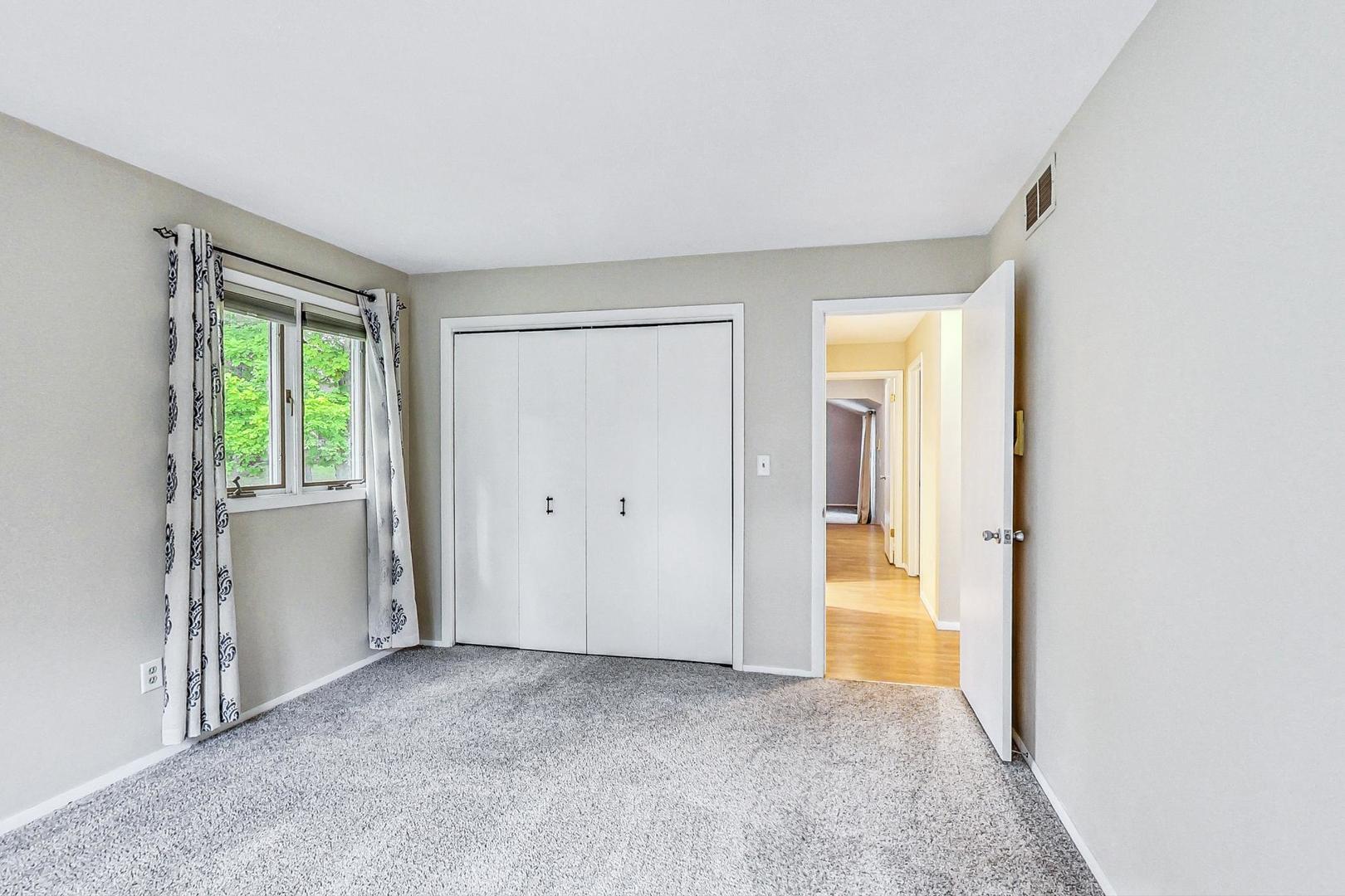 311 Deerpath Drive Winthrop Harbor, IL 60096 - Photo 27 of 48 a view of an empty room and a window