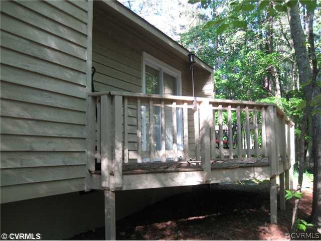 3115 Spreading Oak Road Midlothian, VA 23112 - Photo 3 of 3 a view of backyard with deck and outdoor seating