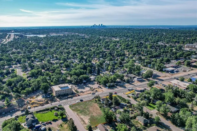 an aerial view of a city with lots of residential buildings