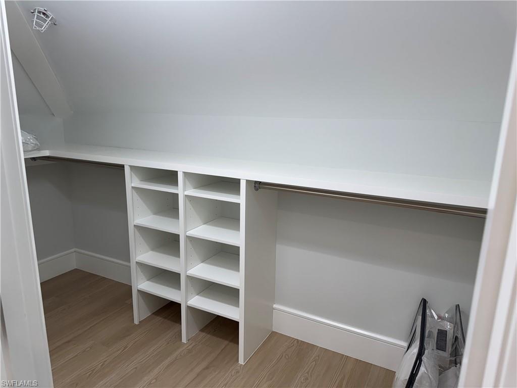 787 4th Avenue South Naples, FL 34102 - Photo 11 of 15 Spacious closet with light hardwood / wood-style flooring