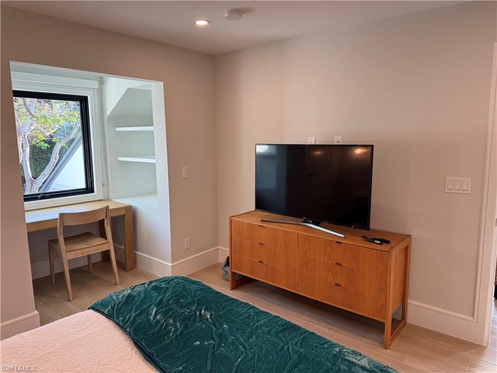 787 4th Avenue South Naples, FL 34102 - Photo 15 of 15 Queen Bedroom featuring hardwood / wood-style floors