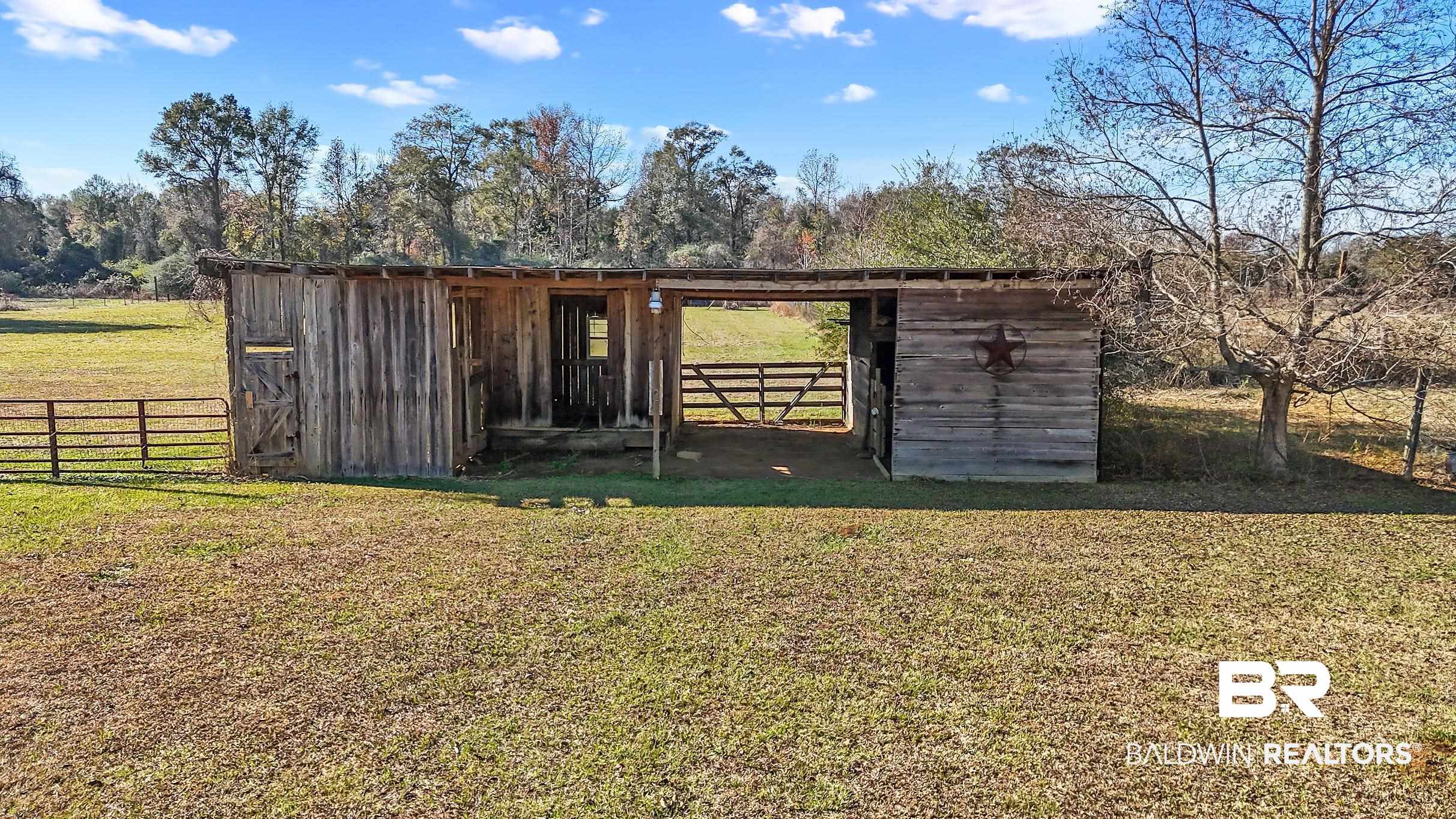 110 Sam Jones Road Atmore, AL 36502 - Photo 31 of 47 View of outbuilding featuring an exterior structure