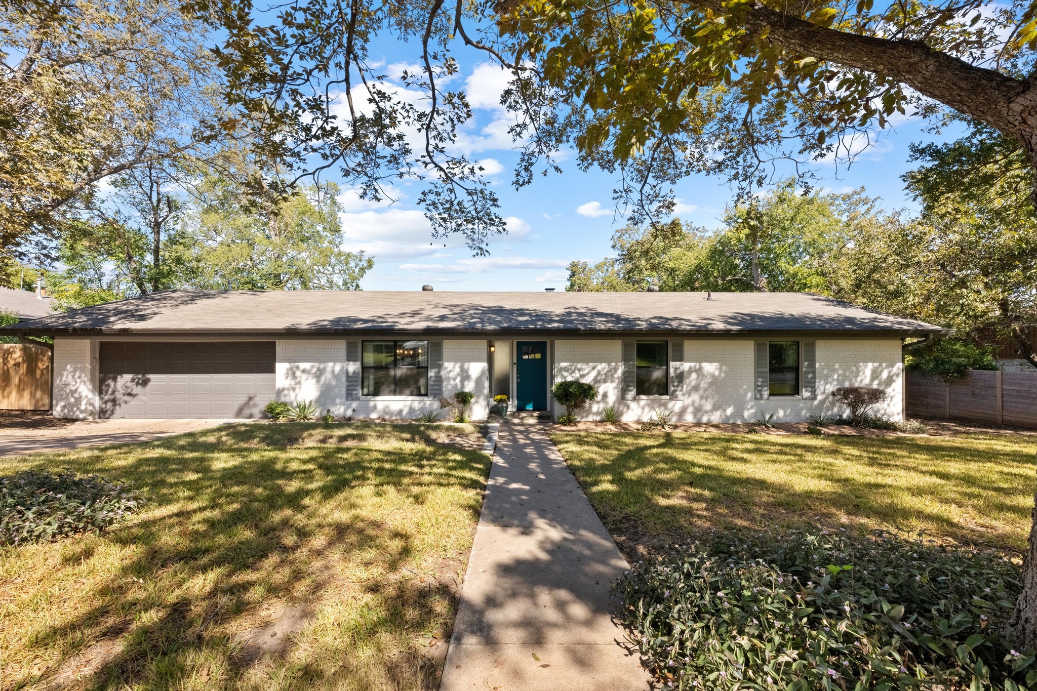 1006 Hollybluff Street Austin, TX 78753 - Photo 2 of 27 Single story home with an attached garage