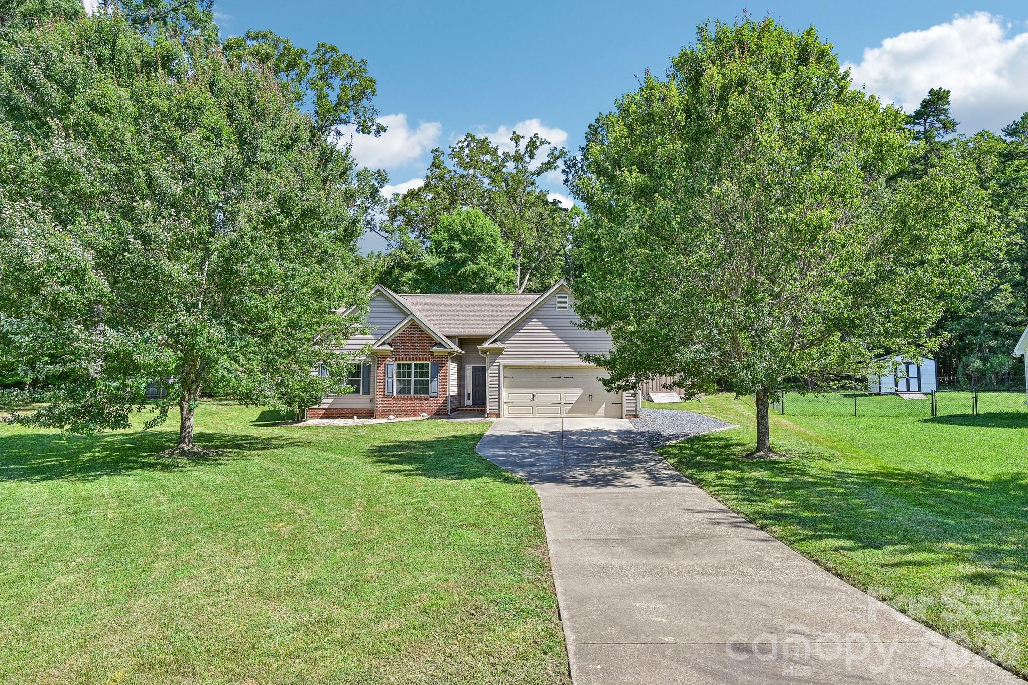 624 Hunley Street Monroe, NC 28112 - Photo 2 of 36 a front view of a house with a yard