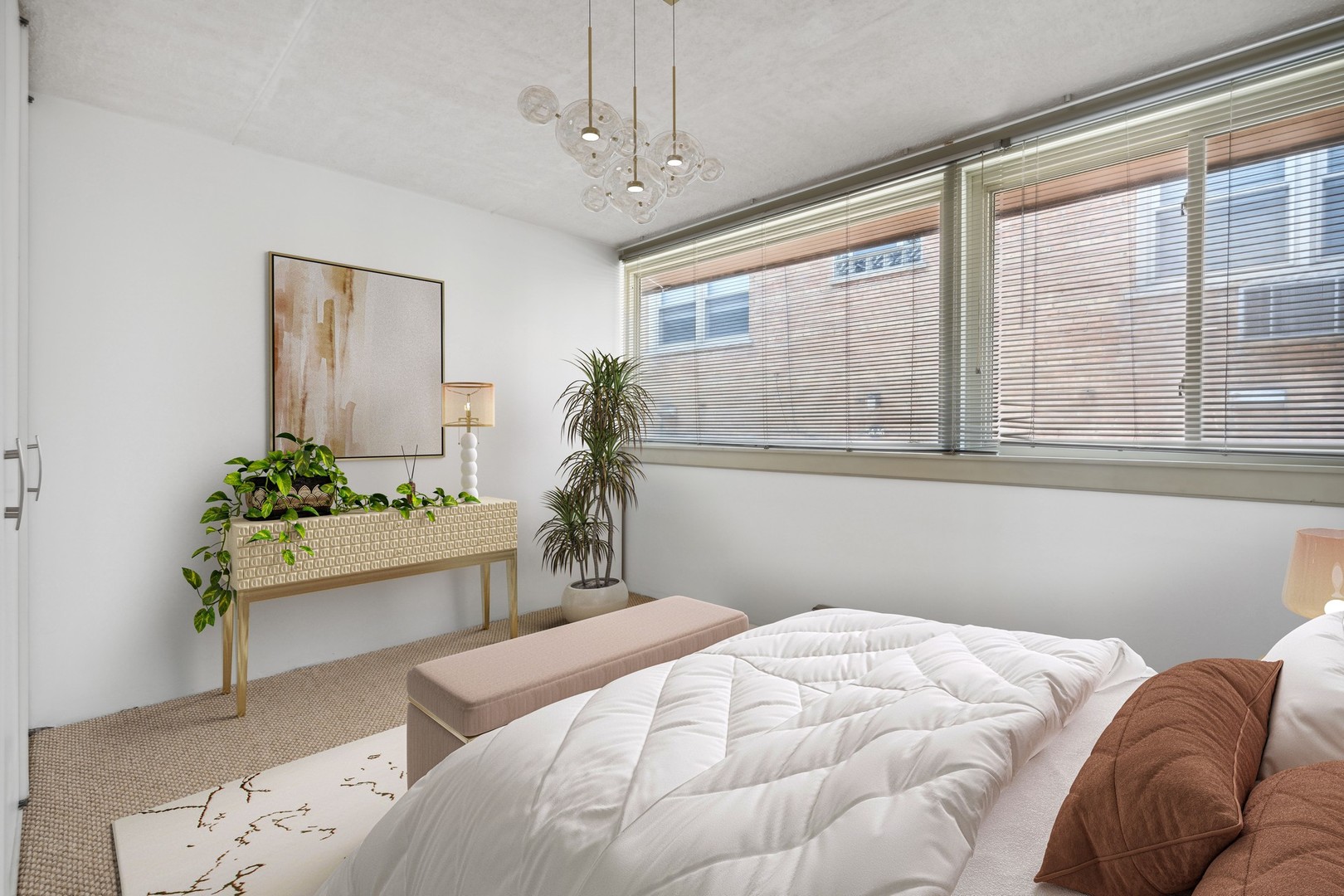 4900 North Lester Avenue, Unit 5 Chicago, IL 60630 - Photo 11 of 18 a bedroom with a bed window and table
