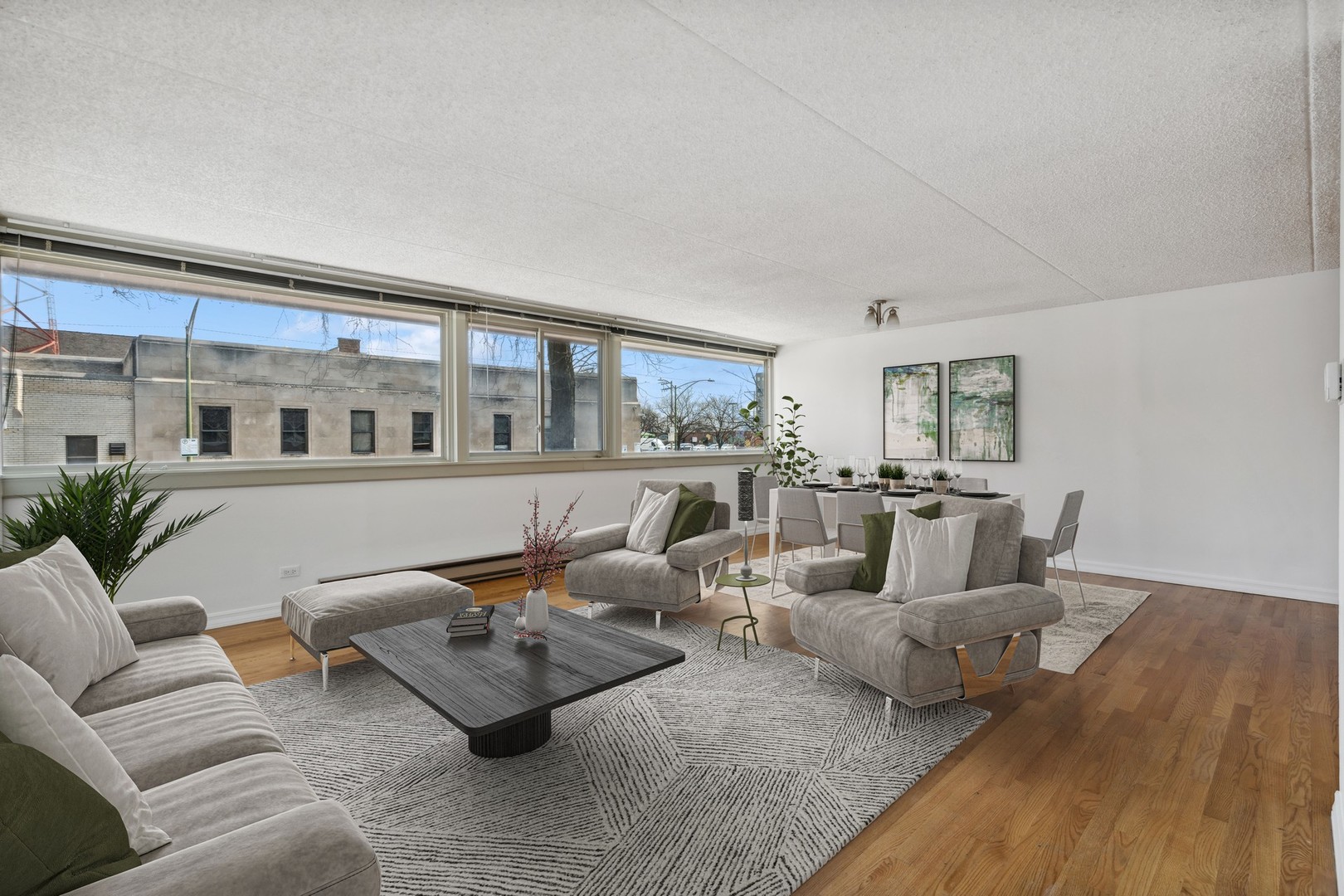 4900 North Lester Avenue, Unit 5 Chicago, IL 60630 - Photo 2 of 18 a living room with furniture and a table