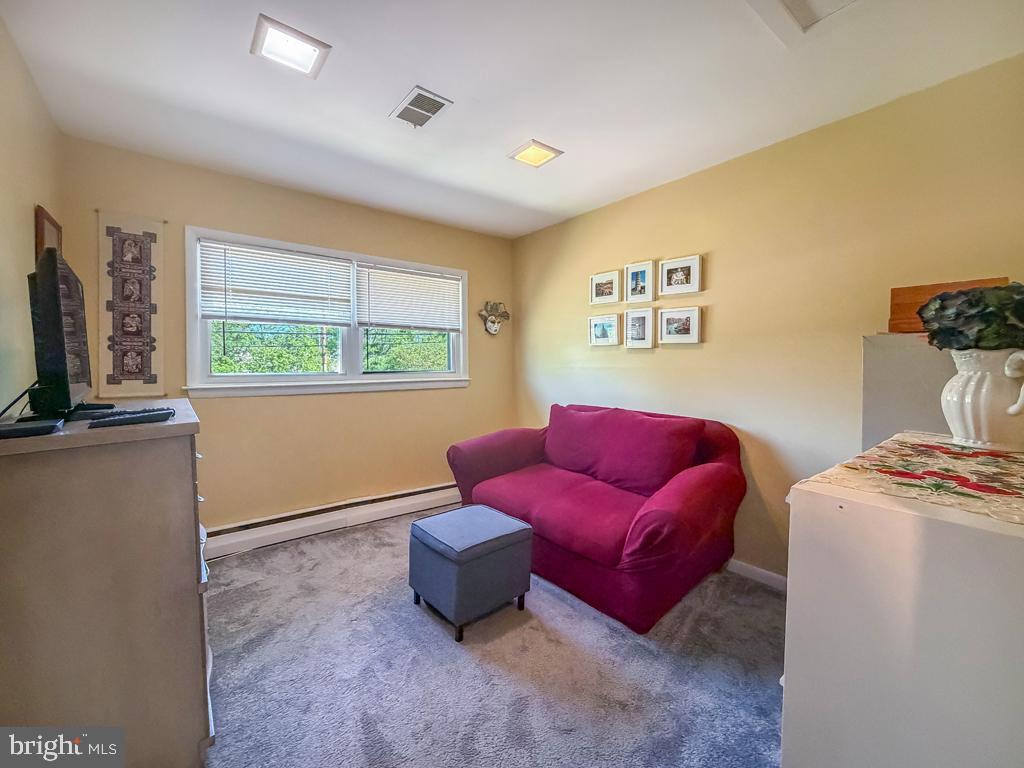 925 Big Oak Road Yardley, PA 19067 - Photo 35 of 51 a living room with furniture and a window