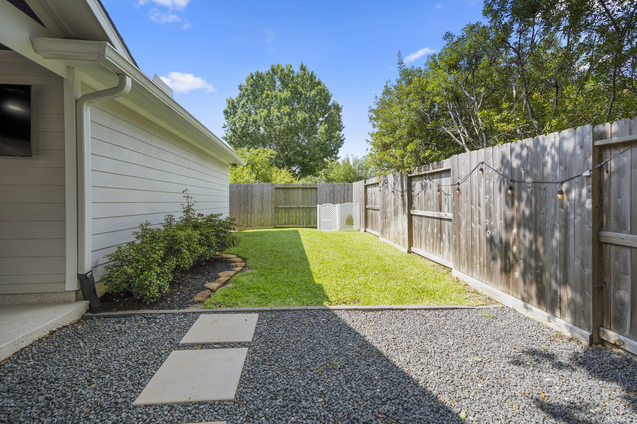 5802 Sawyer Bend Lane Spring, TX 77379 - Photo 35 of 50 a view of a backyard with wooden fence