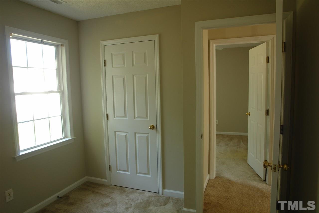 8317 Neuse Rapids Road Raleigh, NC 27616 - Photo 17 of 25 Bedroom #2 looking toward bedroom #3.