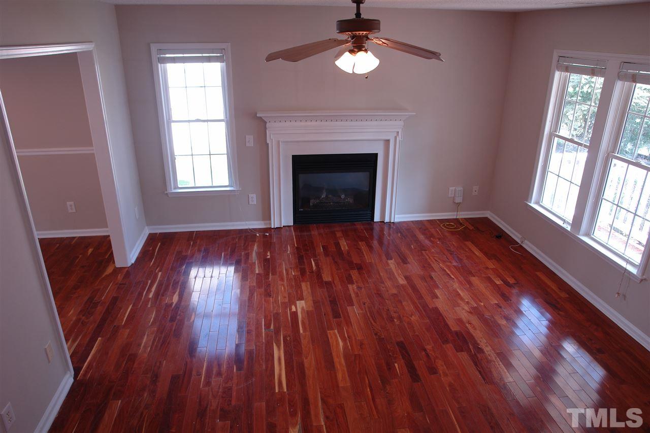 8317 Neuse Rapids Road Raleigh, NC 27616 - Photo 18 of 25 Photo taken from stairwell with light swirling in from front side windows. Glorious!