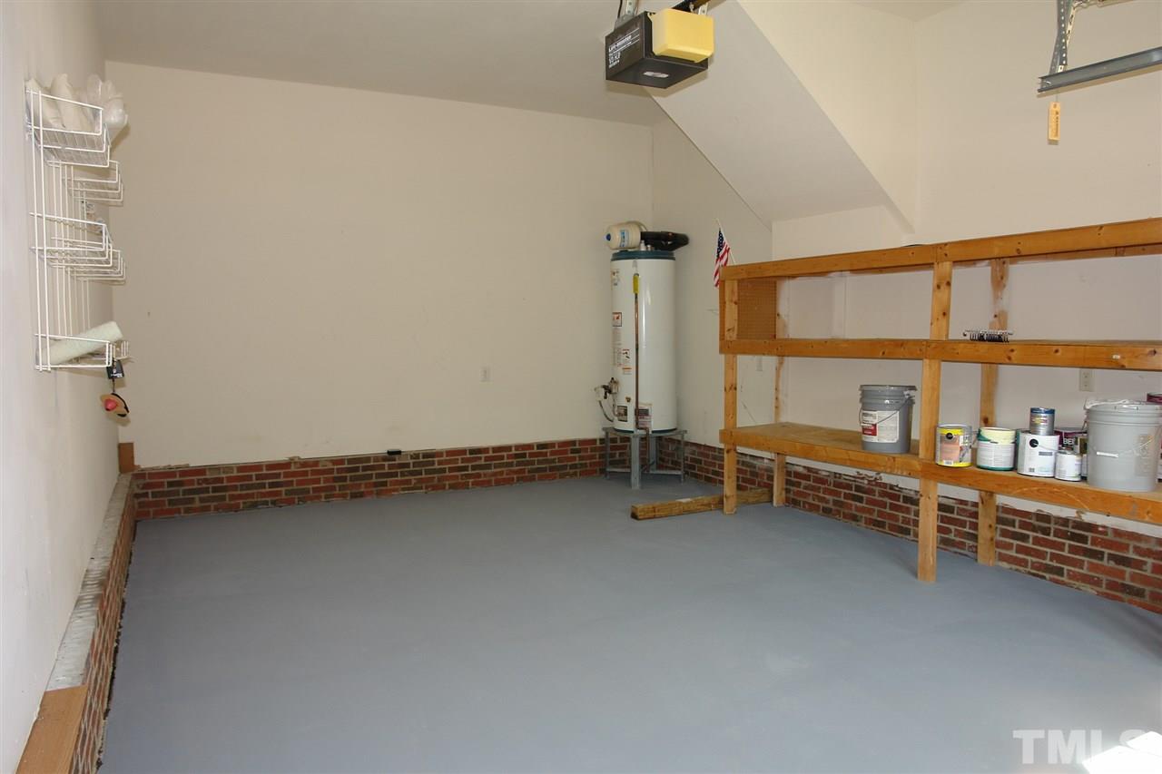 8317 Neuse Rapids Road Raleigh, NC 27616 - Photo 19 of 25 A fantastic Garage for all of your stuff! Floor has been freshly epoxied. Roll right in!