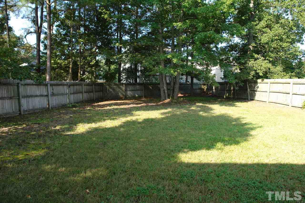 8317 Neuse Rapids Road Raleigh, NC 27616 - Photo 21 of 25 A beautiful back yard with shade and privacy. Hit the LOVE button on this one.