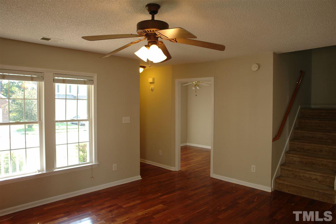 8317 Neuse Rapids Road Raleigh, NC 27616 - Photo 8 of 25 View looking toward entryway and Office (on left) and stairway leading to Bedrooms and Bonus Room upstairs!