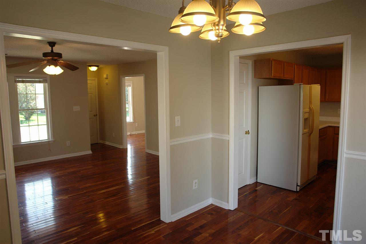 8317 Neuse Rapids Road Raleigh, NC 27616 - Photo 9 of 25 View from the Dining Room looking into Living Room (on left) and Kitchen (on right).