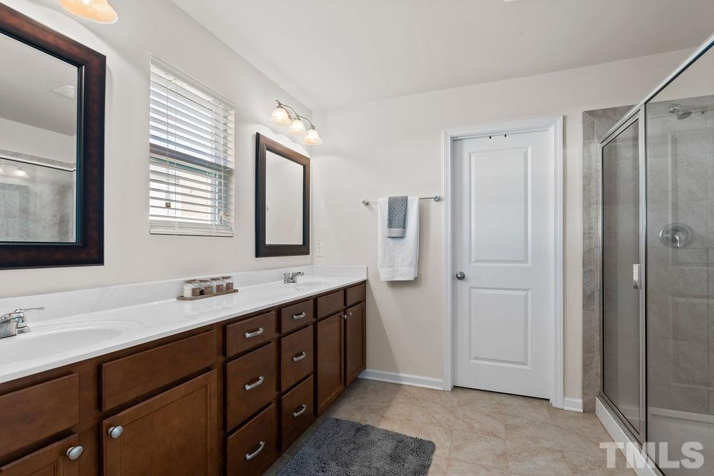 3518 Winding Walk Court Raleigh, NC 27616 - Photo 31 of 46 Enormous WIC, huge shower, and private water closet