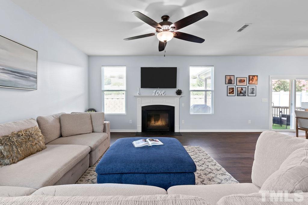 3518 Winding Walk Court Raleigh, NC 27616 - Photo 7 of 46 Spacious family room with gas log fireplace