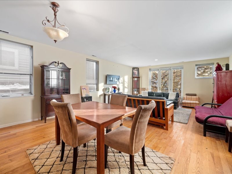 1412 West Diversey Parkway, Unit B Chicago, IL 60614 - Photo 9 of 26 a view of a dining room with furniture and wooden floor