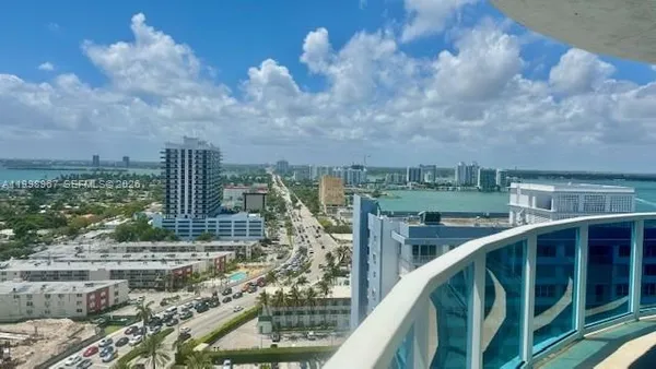 a view of a city from a balcony