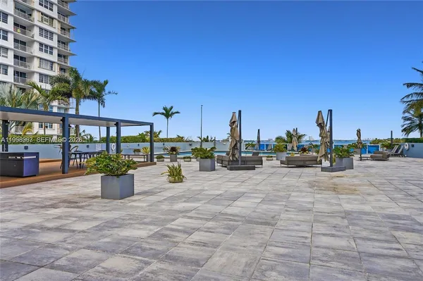a view of a terrace with chairs