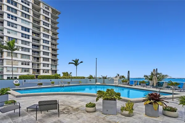 a view of a terrace with sitting area
