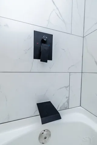 a bathroom with a sink and toilet