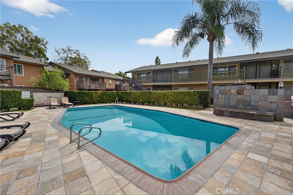 1430 West Lambert Road, Unit 384 La Habra, CA 90631 - Photo 25 of 41 a view of swimming pool with outdoor seating and plants