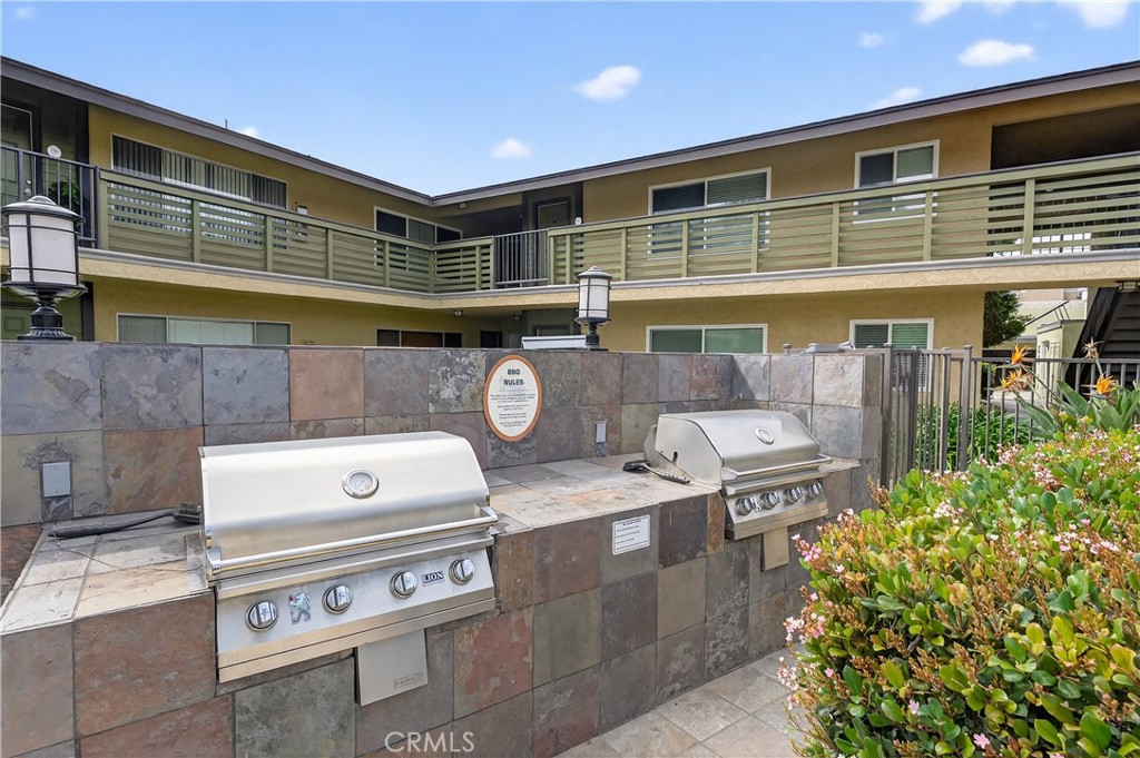1430 West Lambert Road, Unit 384 La Habra, CA 90631 - Photo 27 of 41 a front view of a building with outdoor space