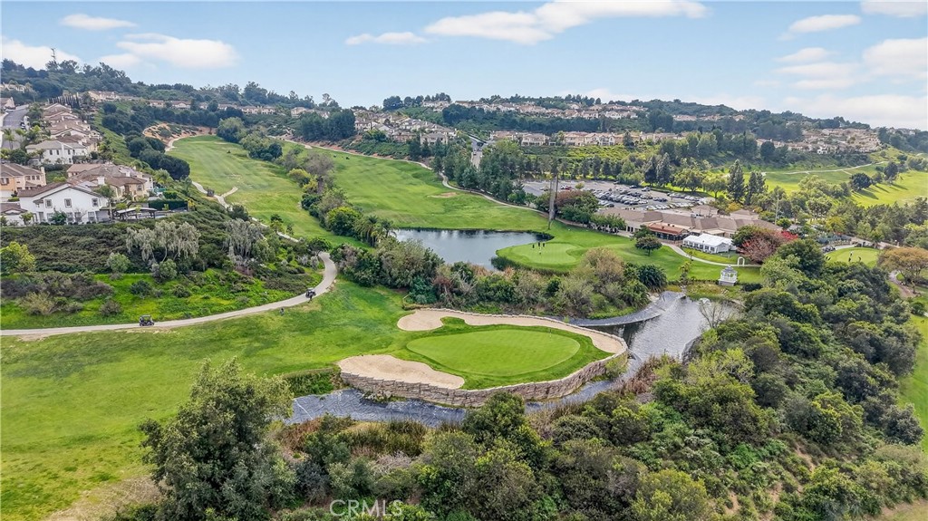 1430 West Lambert Road, Unit 384 La Habra, CA 90631 - Photo 30 of 41 an aerial view of a house with a garden and lake view