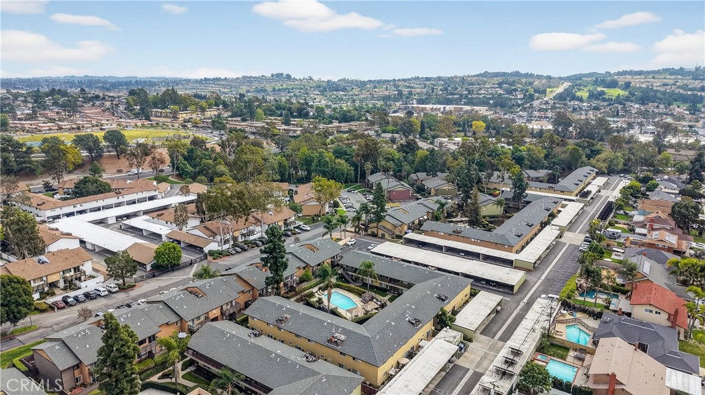 1430 West Lambert Road, Unit 384 La Habra, CA 90631 - Photo 38 of 41 an aerial view of a city with lots of residential buildings
