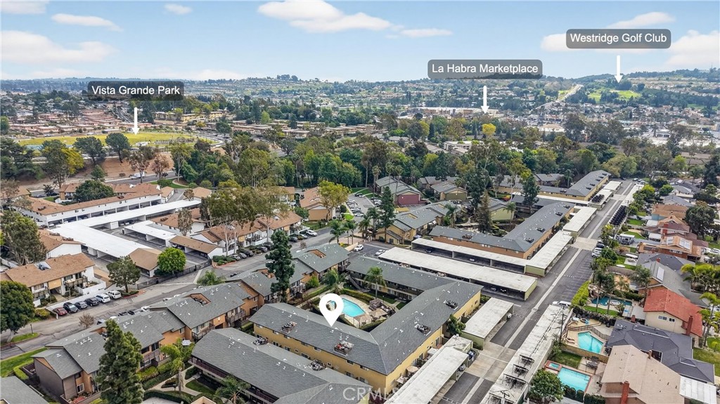 1430 West Lambert Road, Unit 384 La Habra, CA 90631 - Photo 39 of 41 an aerial view of a city with lots of residential buildings