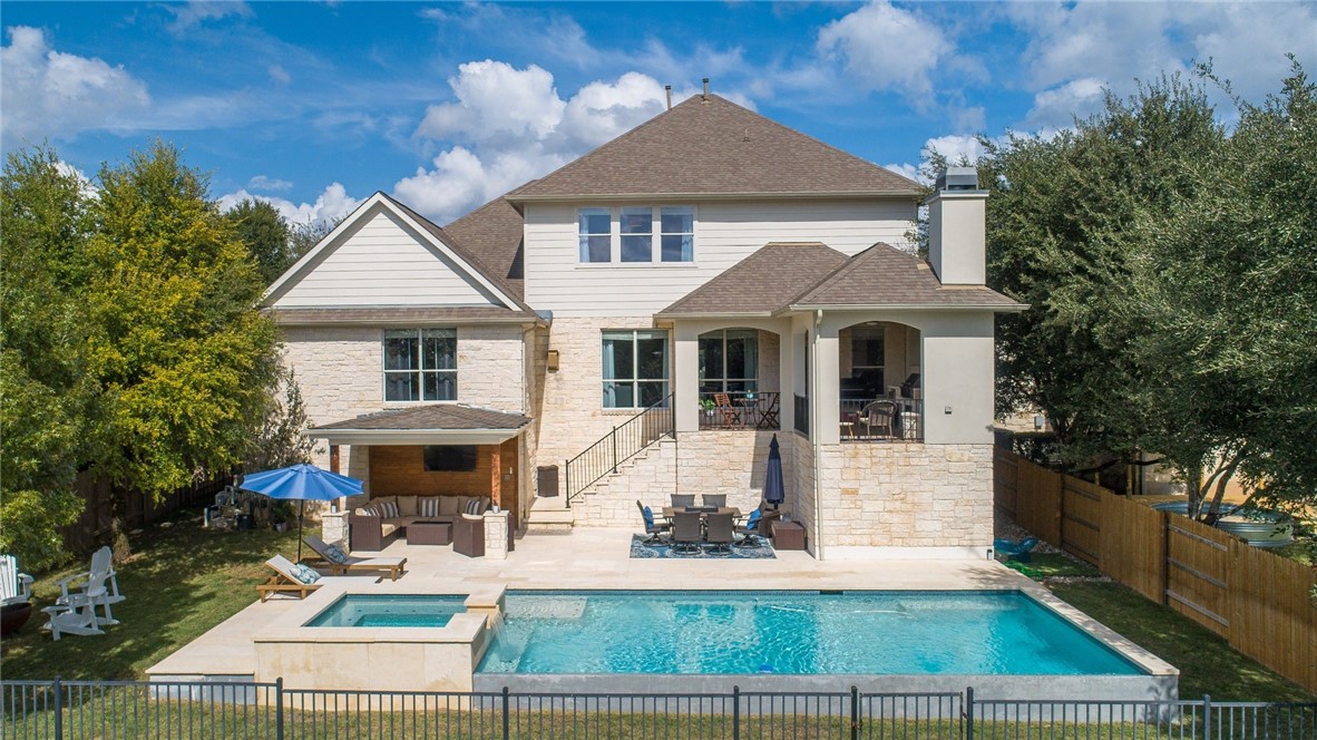 271 Torrington Drive Austin, TX 78737 - Photo 1 of 1 a front view of a house with garden