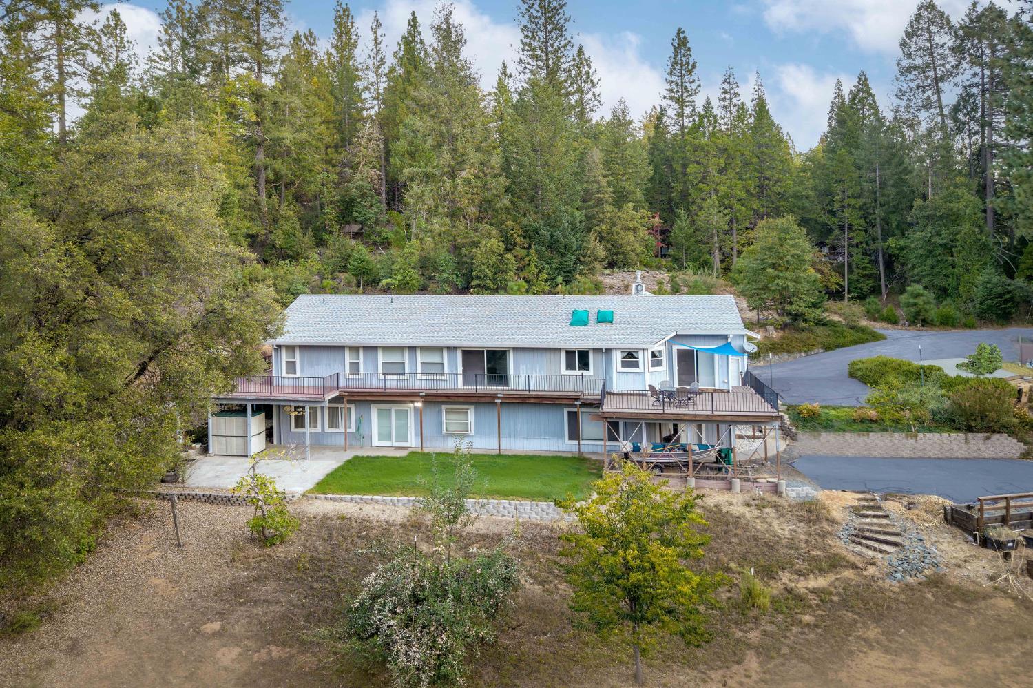 12401 Old Mine Road Grass Valley, CA 95945 - Photo 18 of 87 an aerial view of a house with a big yard
