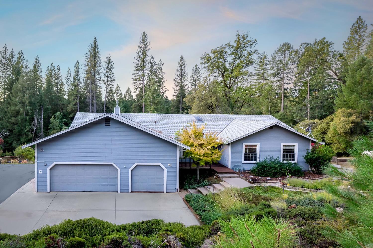 12401 Old Mine Road Grass Valley, CA 95945 - Photo 2 of 87 a house view with a backyard space