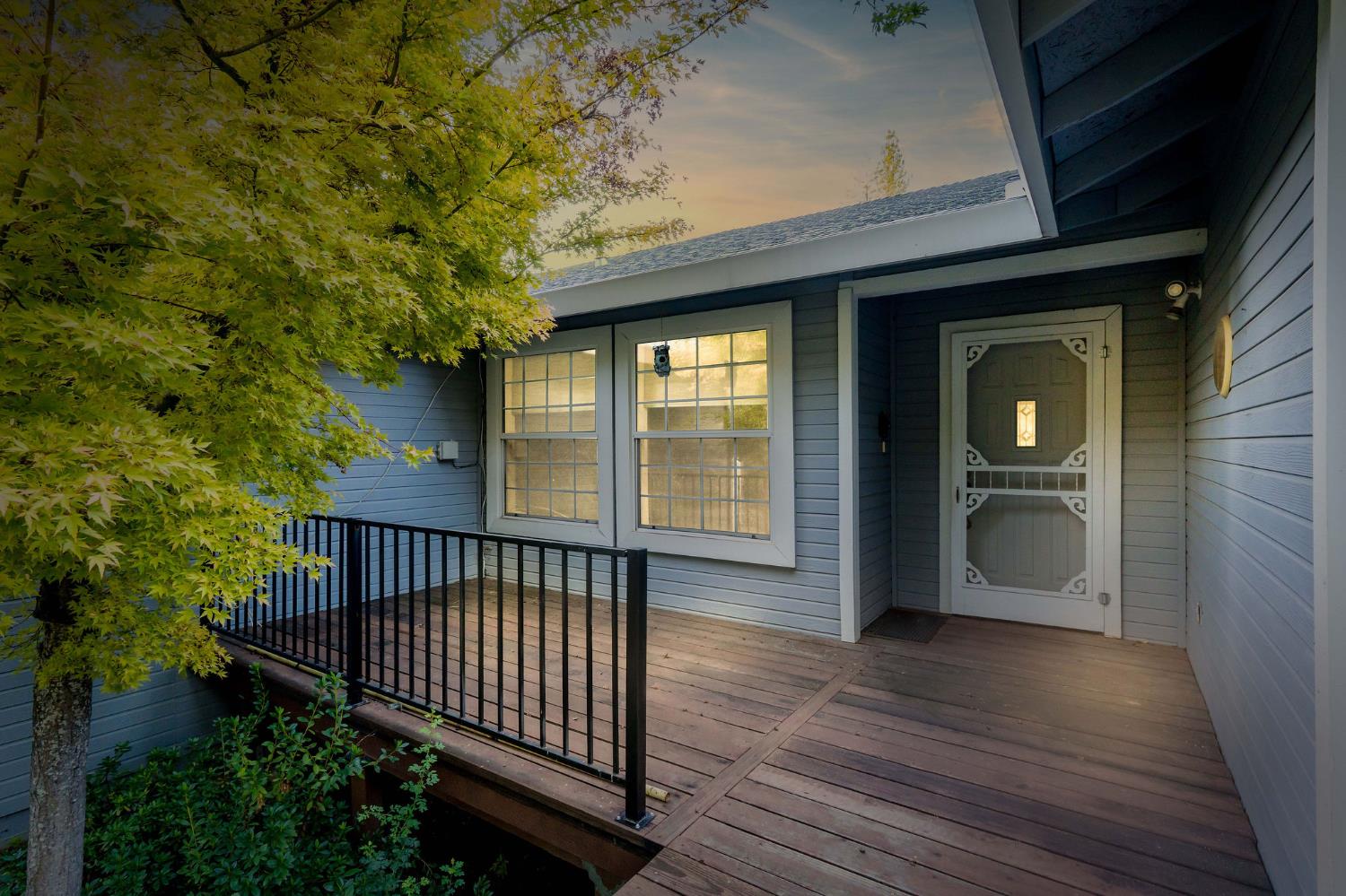 12401 Old Mine Road Grass Valley, CA 95945 - Photo 25 of 87 a view of a porch with wooden floor and fence