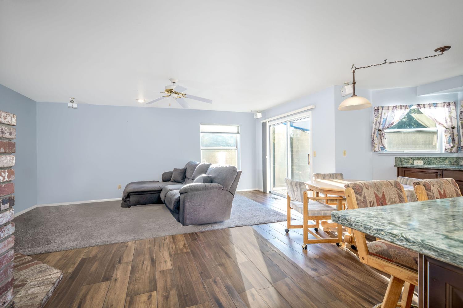 12401 Old Mine Road Grass Valley, CA 95945 - Photo 31 of 87 a living room with furniture and wooden floor