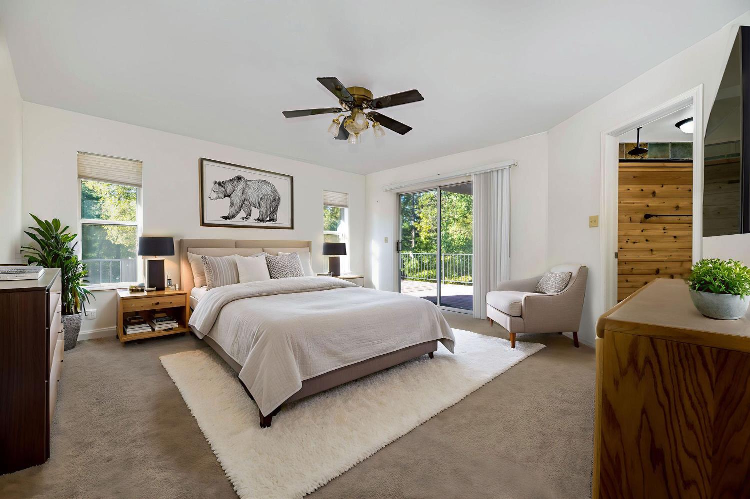 12401 Old Mine Road Grass Valley, CA 95945 - Photo 41 of 87 a bedroom with a bed couch and windows