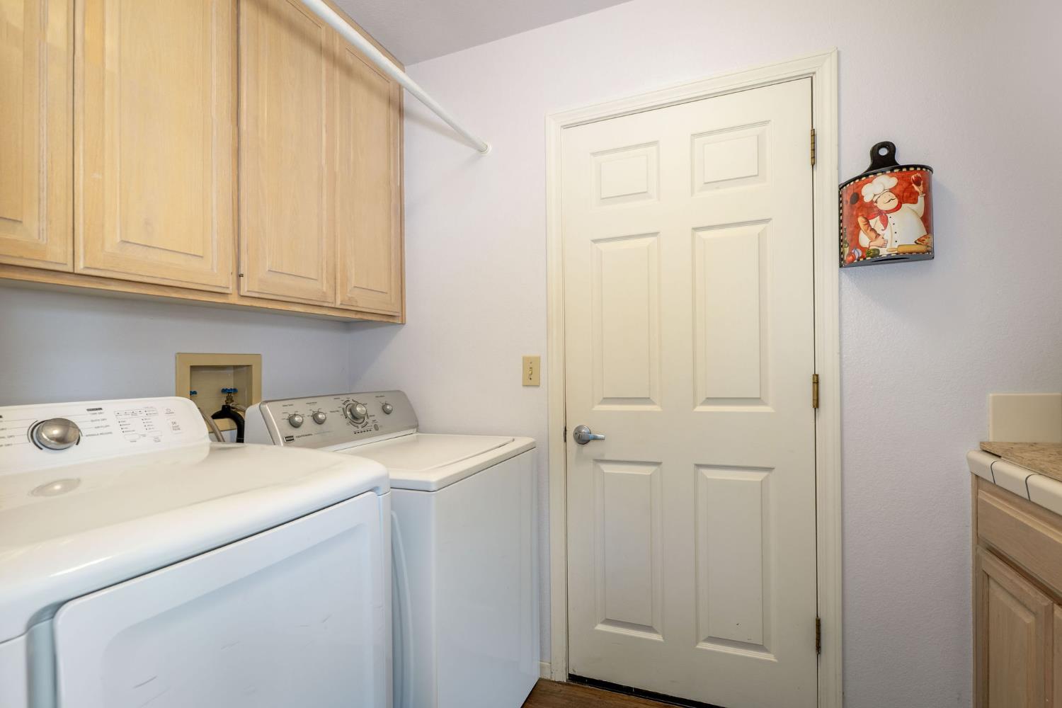 12401 Old Mine Road Grass Valley, CA 95945 - Photo 68 of 87 a view of storage and utility room with washer and dryer