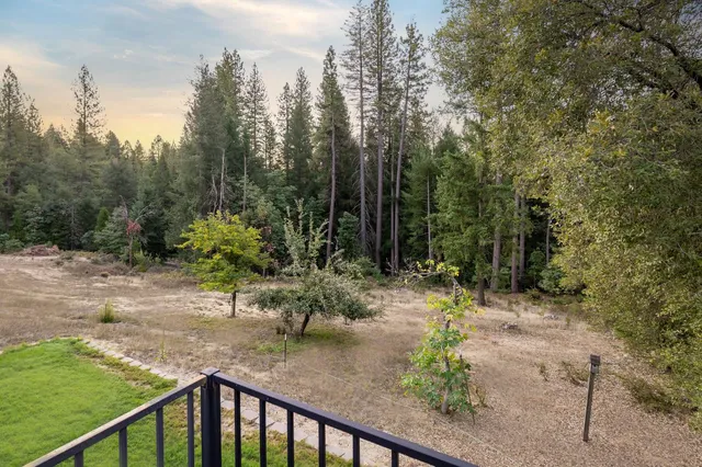 a view of a chairs on the roof deck