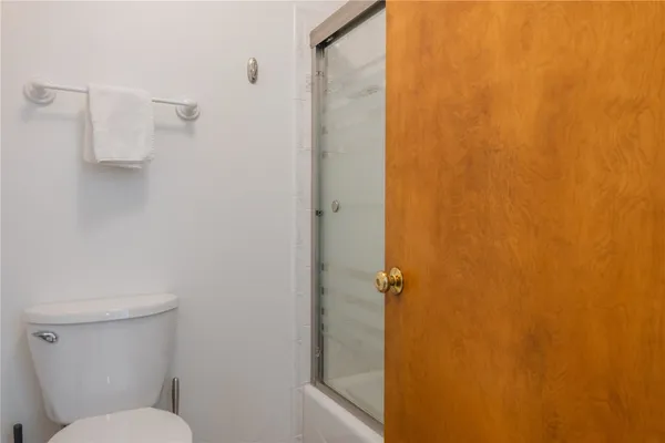 a bathroom with a shower curtain