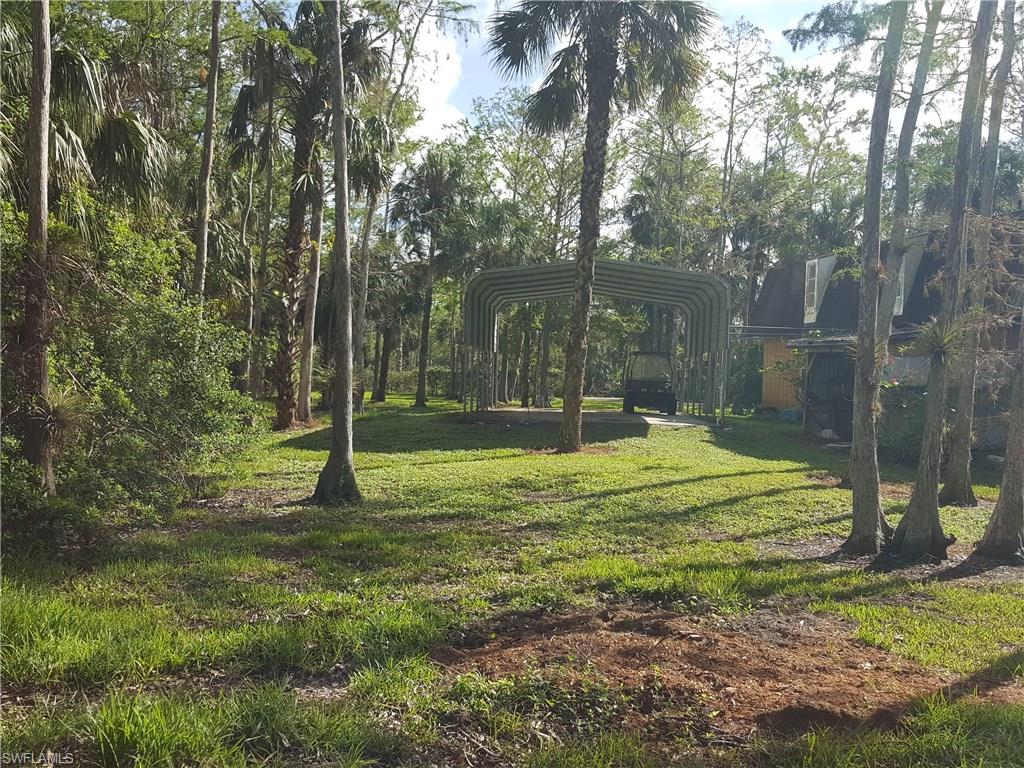 2221 Krape Road Naples, FL 34120 - Photo 13 of 24 a view of a backyard