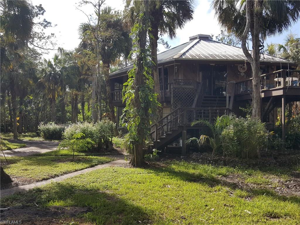 2221 Krape Road Naples, FL 34120 - Photo 4 of 24 a view of a backyard