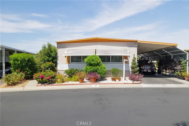 front view of a house with a patio