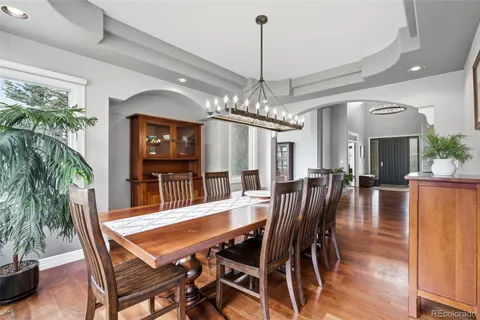 a bathroom with a sink mirror and toilet