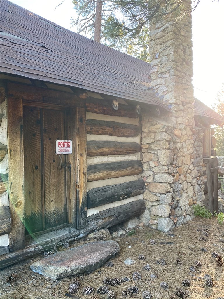 0 Cienega Road Big Bear Lake, CA 92315 - Photo 20 of 29 a front view of a house with a yard