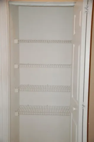 an aerial view of residential house with outdoor space and swimming pool