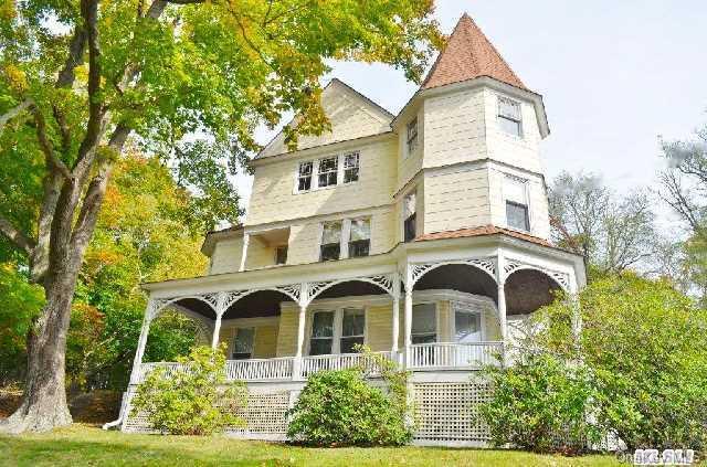 278 Sound Road Wading River, NY 11792 - Photo 1 of 1 front view of a house with a garden