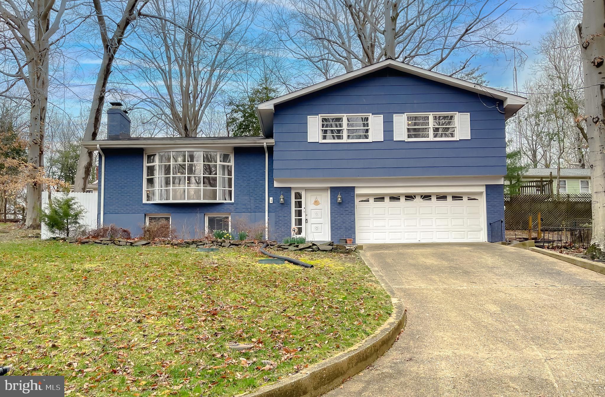 6056 Fir Road St. Leonard, MD 20685 - Photo 1 of 39 a view of a house with yard