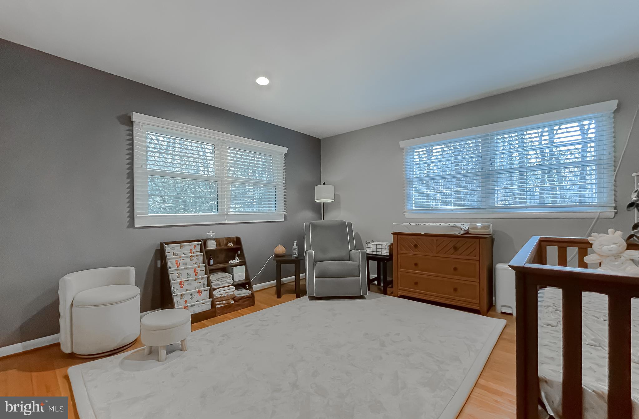 6056 Fir Road St. Leonard, MD 20685 - Photo 26 of 39 a bedroom with furniture and a window