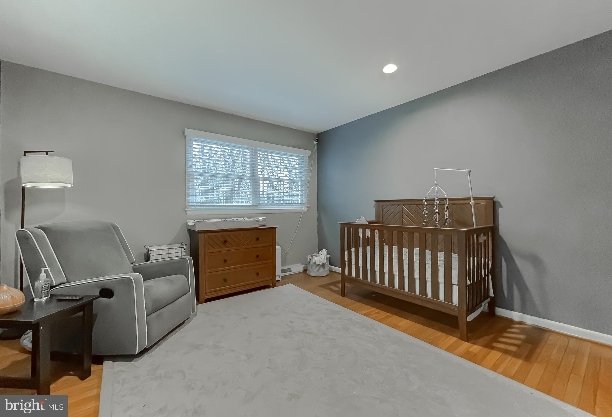6056 Fir Road St. Leonard, MD 20685 - Photo 28 of 39 a bedroom with furniture and windows